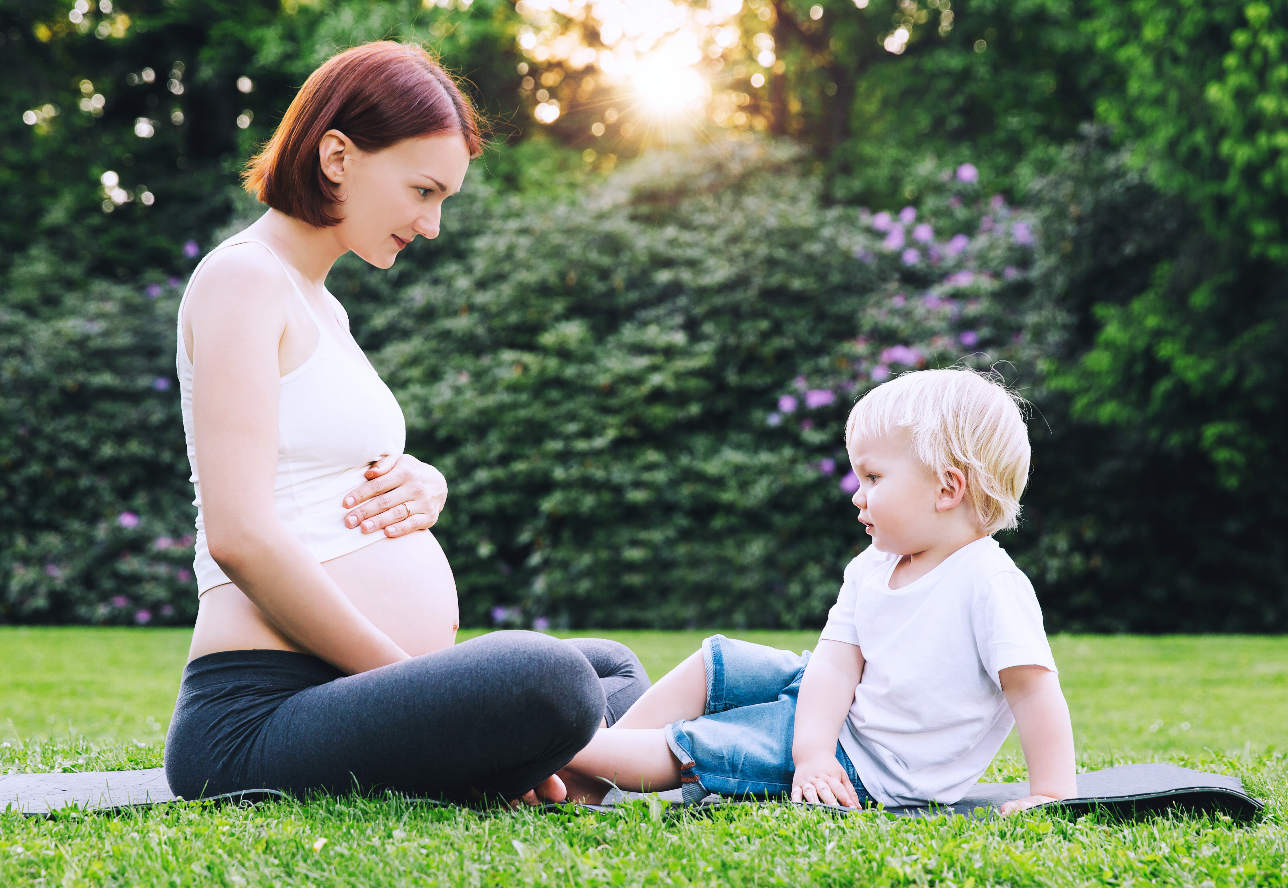 Pregnant Mother Talking to Her Son