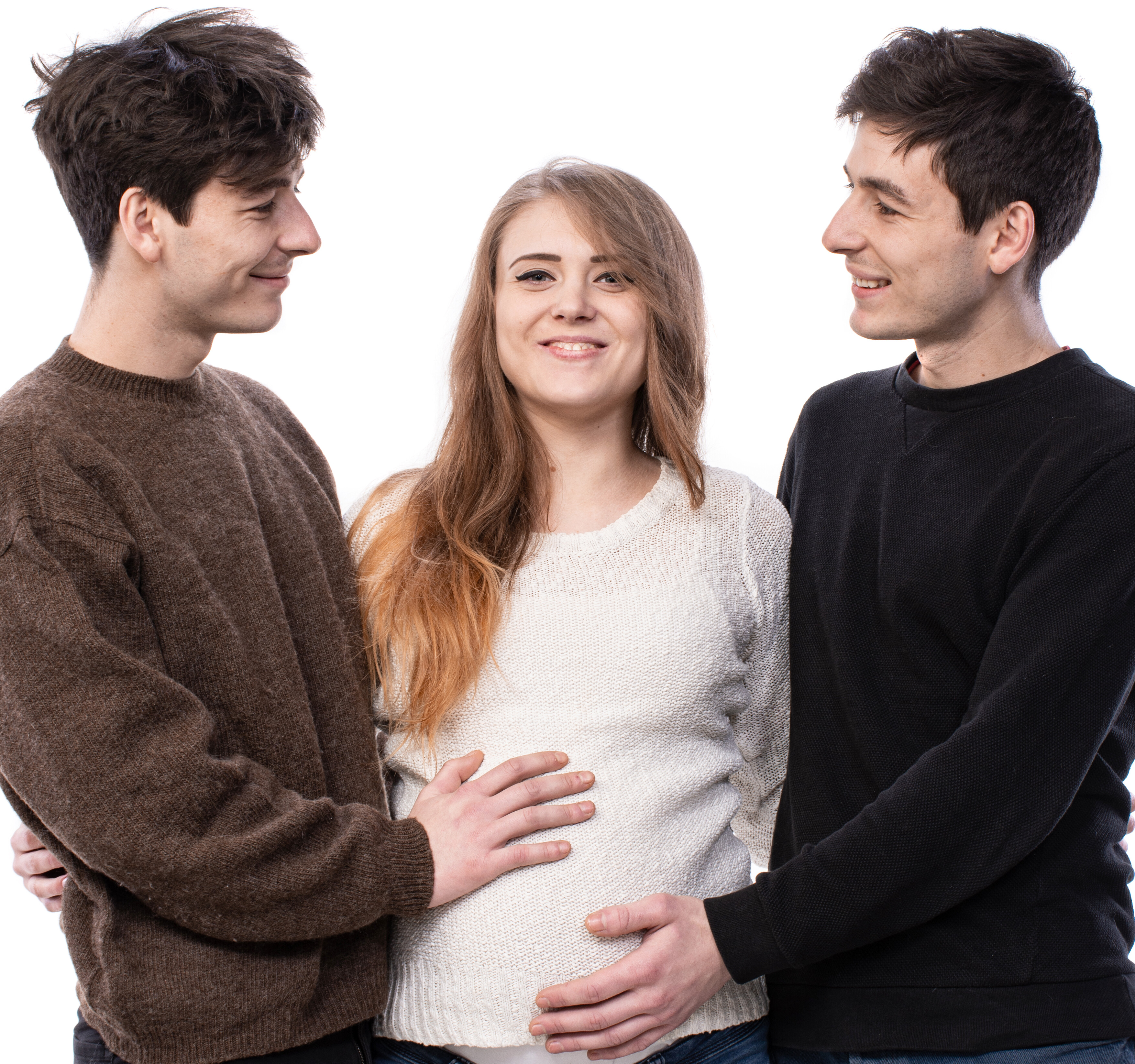Pregnant Surrogate and Intended Parents Laughing